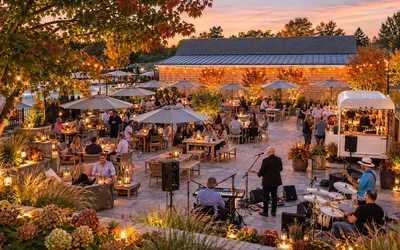 A band playing for guests dining on the Miss May's patio on a fall evening