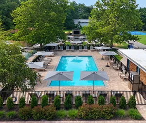 Pool at North Fork Resort with umbrellas and lounge chairs, seen from above